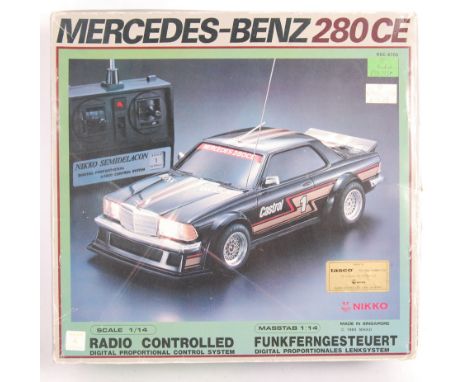 An original vintage 1980's (1984) Nikko made RC Radio Controlled ' Mercedes Benz 280CE '. Battery operated, and appears compl