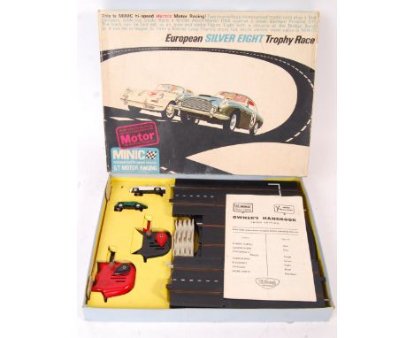 An original vintage Tri-ang / Triang Minic set No. M.1514 ' European Silver Eight Trophy Race ' playset. Appears complete, in