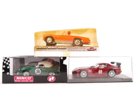 A group of three boxed 1/32 scale slot car racing models comprising: Ninco 50126 Porsche 356A Speedster, Fly Dodge Viper Uk S