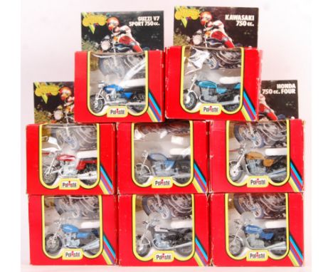 A collection of 8x original vintage Polistil made 1/24 scale diecast model motorcycles / motorbikes to include Honda, Guzzi, 