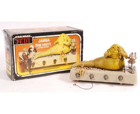 An original vintage Kenner made action figure playset ' Jabba The Hutt Action Playset '. 100% complete (no instructions), wit