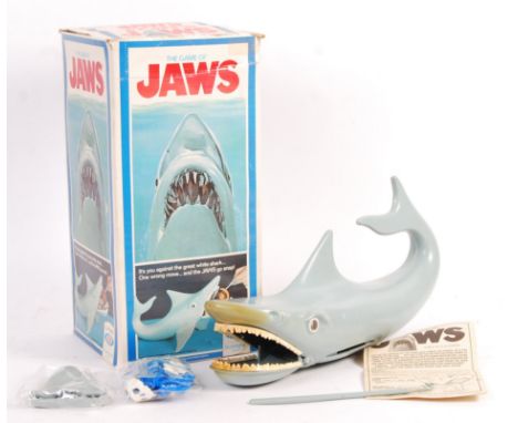 An original vintage Ideal made ' The Game Of Jaws ' movie tie-in boxed game. Appears complete, including the smaller accessor