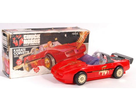An original vintage Kenner made ' Chuck Norris Karate Kommandos ' boxed action figure playset ' Karate Corvette Vehicle '. Th