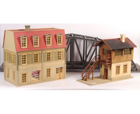 A collection of x3 vintage G Scale model railway trainset scenic buildings - the first being a three storey German building b