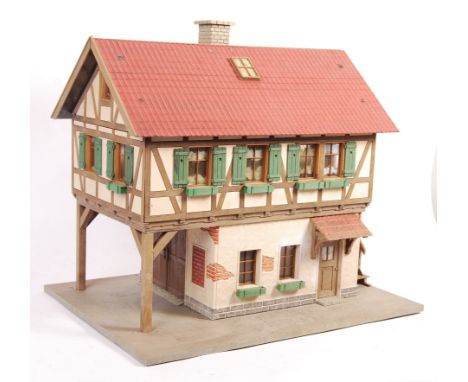 An original vintage believed Faller / Pola made G Scale model railway trainset scenic building. Based on a German three store