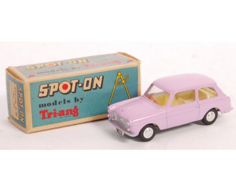 A vintage Tri-Ang Spot On made 1/43 scale diecast model No. 154 ' Austin A40 '. Pink, with lemon interior and red steering wh