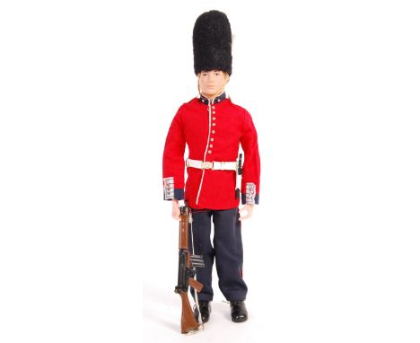 An original vintage 1970's (1970) Palitoy made Action Man ' Grenadier Guard ' action figure. With uniform - comprising: helme