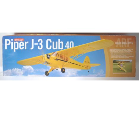 A Horizon Hobby / Hangar 9 made ' Almost-Ready-To-Fly ' RC radio controlled model aeroplane / plane ' Piper J-3 Cub 40 '. Inc