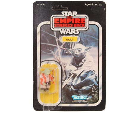 An original vintage 1980 Kenner made Star Wars carded MOC action figure ' Yoda ' (Orange Snake variation). Factory sealed upo