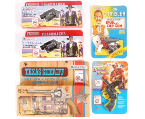 A collection of 5x original vintage 1980's Lone Star boxed diecast cowboy cap guns comprising two Peacemaker's, The Gambler, 
