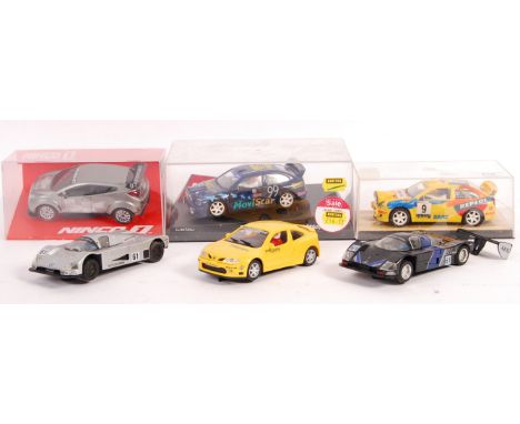 A collection of 6x assorted 1/32 scale slot car racing models comprising: boxed Ninco Seat, Ninco 50182 Seat Cordoba WRC Cata