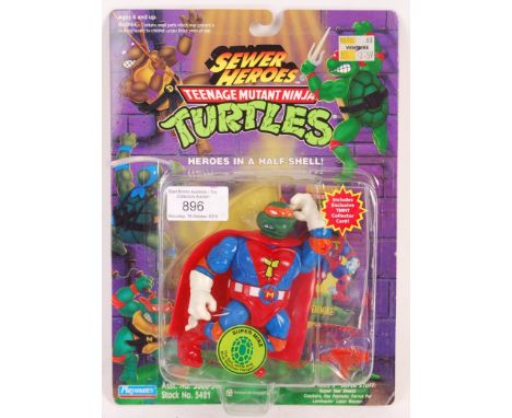 An original vintage 1990's (1994) Playmates made TMNT Teenage Mutant Ninja Turtles carded action figure ' Super Mike ' from t