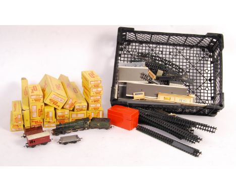 An interesting large collection of vintage Tri-ang / Triang Railways TT Gauge model railway trainset items. Includes; unboxed