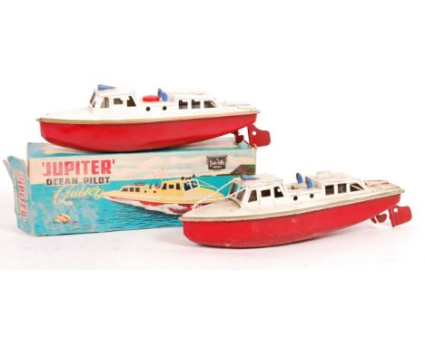 Two original vintage Sutcliffe made ' Jupiter ' tinplate clockwork boats. One appearing generally in good condition (missing 