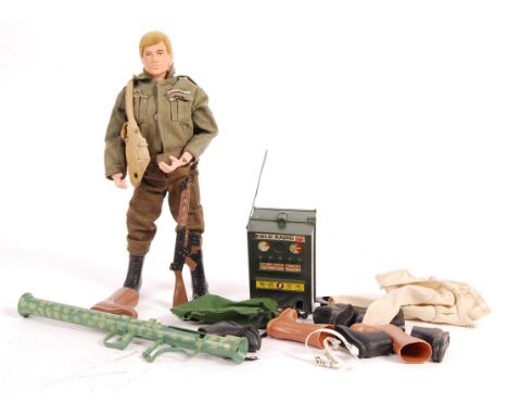 An original vintage Palitoy made Action Man figure - with blonde flocked hair and plastic hands, dressed in uniform, along wi
