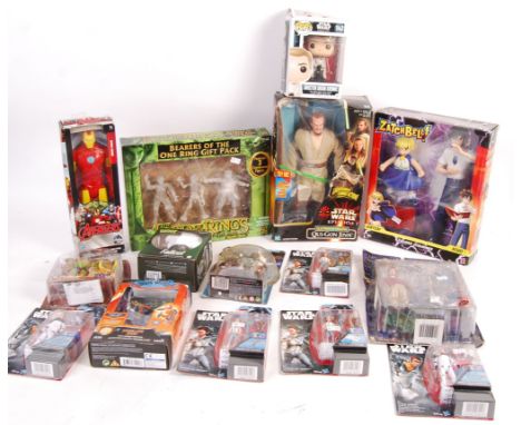 A collection of approx x15 assorted TV / Film carded / boxed action figures - includes: Star Wars, Zatchbell, Lord Of The Rin