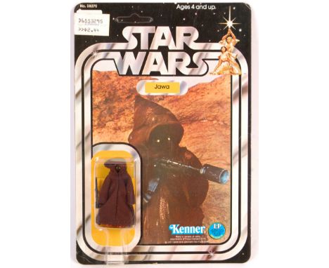 An original vintage ex-shop stock condition 1977 Kenner made Star Wars carded MOC action figure ' Jawa '. Factory sealed upon
