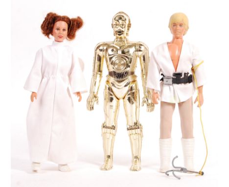 A collection of x3 vintage Kenner made Star Wars 12" action figures - Princess Leia, Luke Skywalker and C3PO. All unboxed, Lu