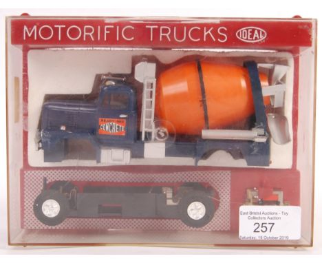 An original Ideal made Motorific Trucks slot car racing ' Ready Mix Concrete ' cement mixing truck. Appears mint within the o