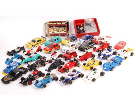 A large collection of approximately 30x assorted Scalextric 1/32 scale slot car racing models and spares. Includes: Ford, F1,