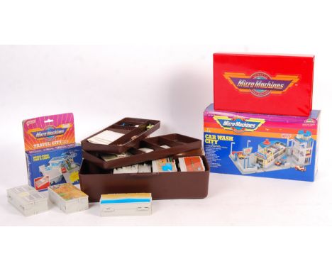 A collection of original vintage 1980's Galoob made ' Micro Machines ' playsets. Includes a toolbox filled with assorted vehi