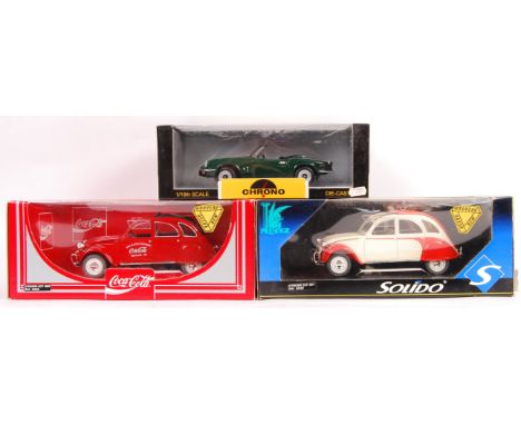 A group of three boxed 1/18 scale diecast models comprising: Solido Coca Cola 9609 Citroen 2CV 1966, Solido Prestige 8030 197