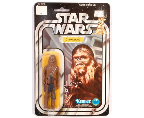 An original vintage 1977 Kenner made Star Wars carded MOC action figure ' Chewbacca '. Factory sealed upon it's original 12 b