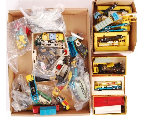 A large collection of assorted original vintage Tri-ang / Triang Minic Motorways vehicles, spares, accessories and parts. Inc