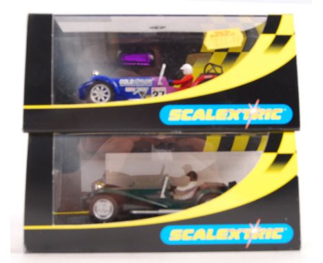 Two original vintage Scalextric 1/32 scale slot car racing models comprising: C2210 Caterham 7 and C2230 Lotus 7 Green. Both 