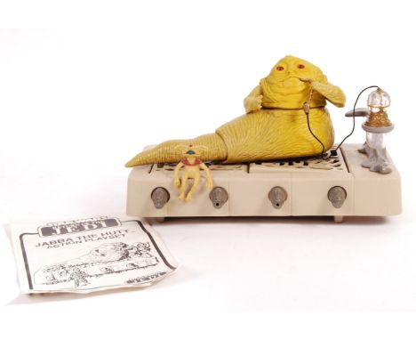 An original vintage Kenner / Palitoy made action figure playset ' Jabba The Hutt Action Playset '. 100% complete (including i
