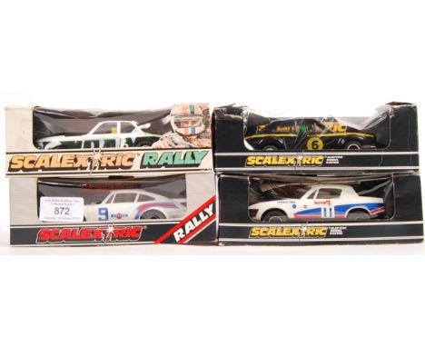 A collection of 4x original vintage Scalextric 1/32 scale slot car racing models comprising: C116 BMW Turbo 320, C125 Porsche
