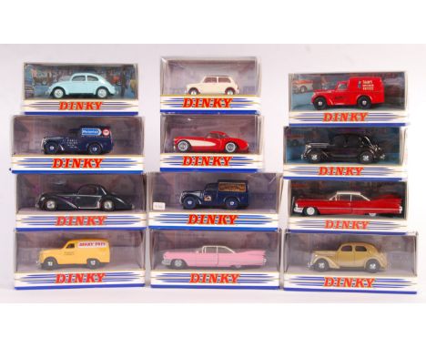 A collection of 12x vintage Dinky Toys made boxed diecast model cars. To include: DY-8, DY-5C, DY-5, DY-14, DY-23 and others.