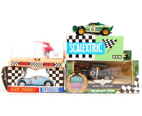 A collection of 4x original vintage Scalextric 1/32 scale slot car racing models comprising:Race Tuned Ford GT, 090007 Mini A