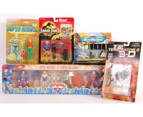 A collection of original vintage TV and Film related carded action figures / sets comprising: Toy Biz DC Comics Superheroes A
