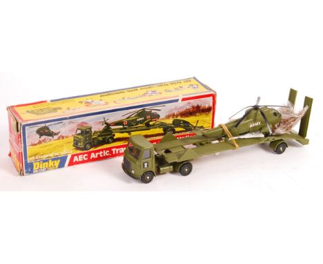 An original vintage Dinky Toys military themed boxed diecast model No. 660 ' AEC Artic Transporter With Helicopter '. Appears