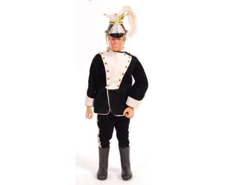 An original vintage 1970's (1972) Palitoy made Action Man ' 17th / 21st Lancers ' action figure. With uniform - comprising: h