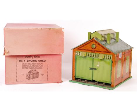A rare original vintage Hornby Series made 0 gauge tinplate ' No.1 Engine Shed '. Litho-printed tin construction, complete wi