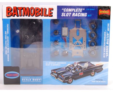 An original Polar Lights made Batman Batmobile 1/32 scale slot car racing kit. Completely factory sealed in original cellopha