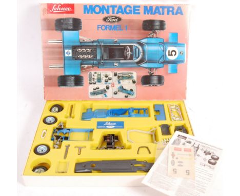 A rare vintage Schuco made ' Montage Matra Ford Formel 1 ' ( Formula 1 ) clockwork tinplate racing car model / kit. The conte