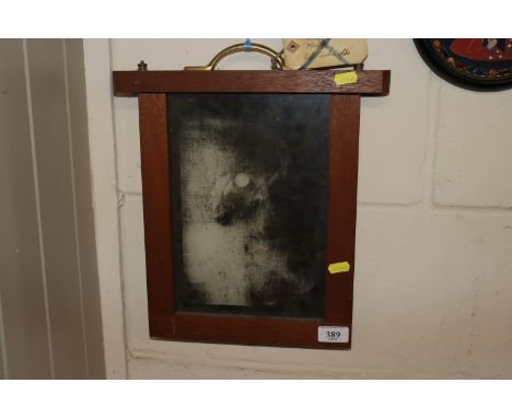 A vintage framed and glazed X-ray slide of a male left cerebral lobe 
