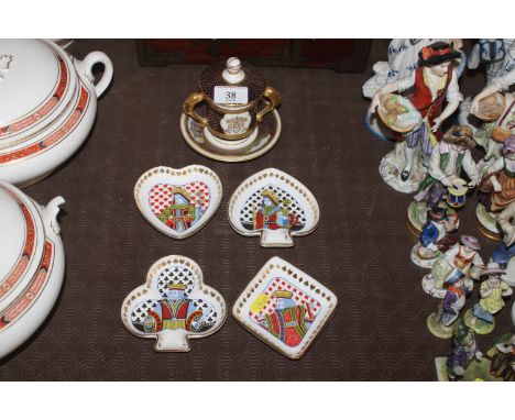 Four Spode playing card dishes; and a Spode scenic decorated "Greenwich" chocolate cup and saucer, limited edition number 61