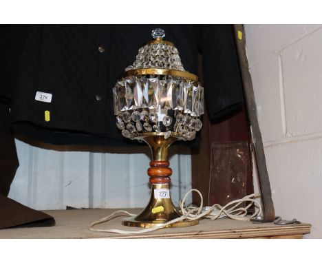 A brass and cut glass table lamp