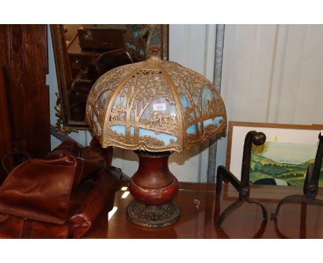 An Art Nouveau gilded and opaque panel table lamp 
