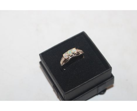 A Sterling silver and three stone opal set ring, ring size M/N