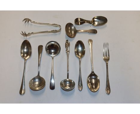 A quantity of various silver spoons including caddy spoons, one silver fork, a pair of silver sugar tongs, approx. total weig