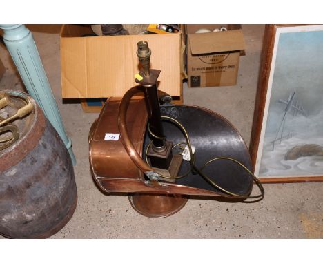 An antique copper coal scuttle and a brass mounted Laura Ashley table lamp