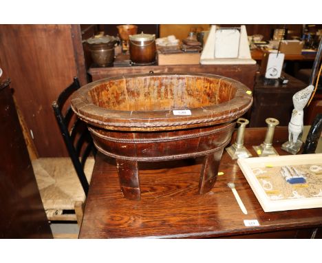 An oval wooden planter 