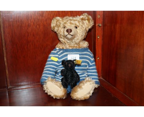 A Steiff Teddy bear and a miniature Steiff black bear