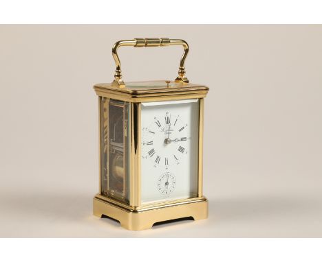 English brass repeating carriage clock, white enamel dial, roman numerals and alarm dial, marked St. James London (with Key),
