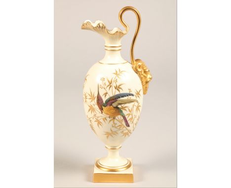 Royal Worcester ewer, baluster form, square foot, gilt scroll handle with bacchus mask, decorated with a colourful humming bi